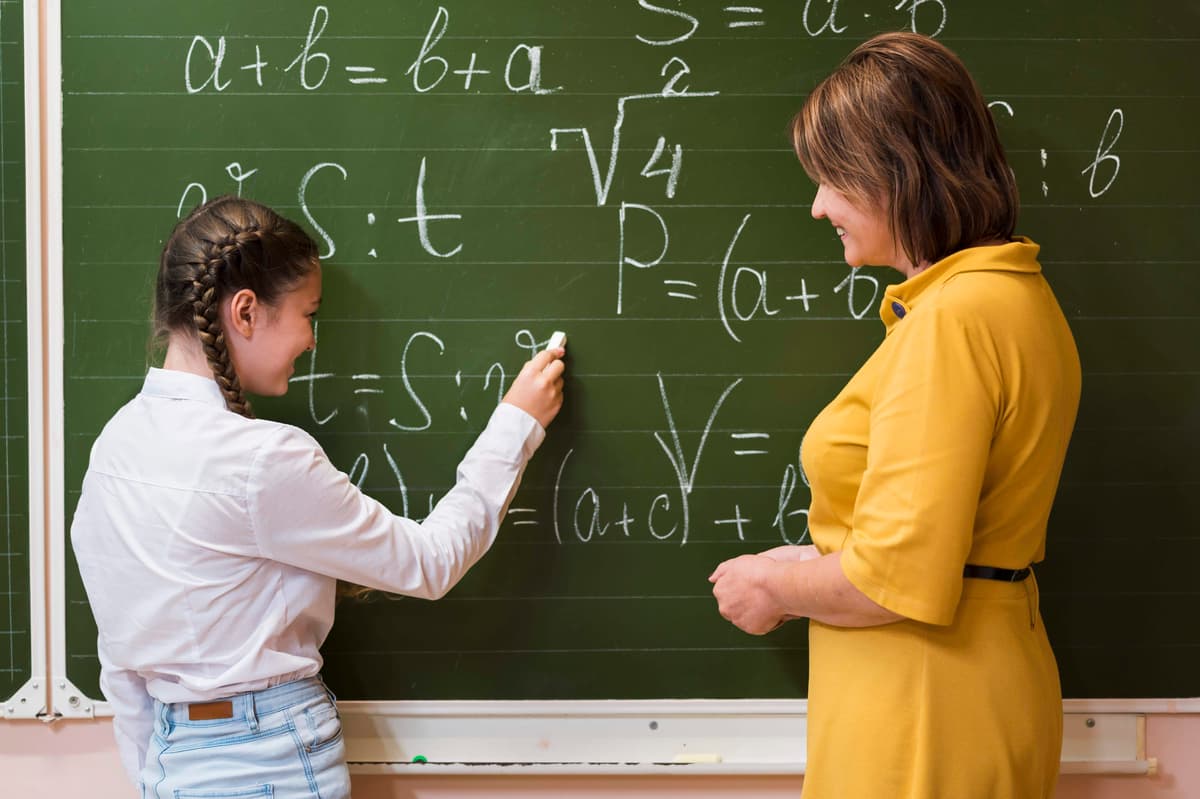 teacher-explaining-lesson-girl
