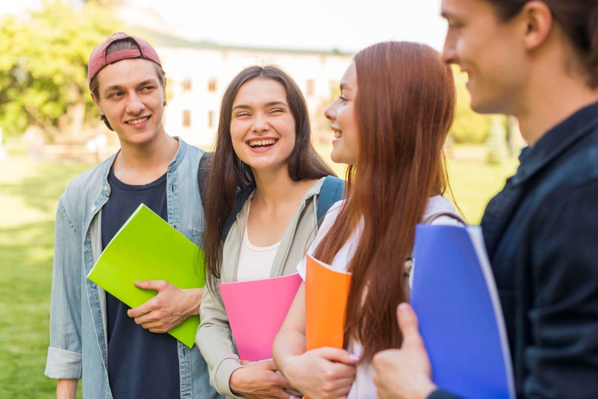 group-students-happy-be-back-university