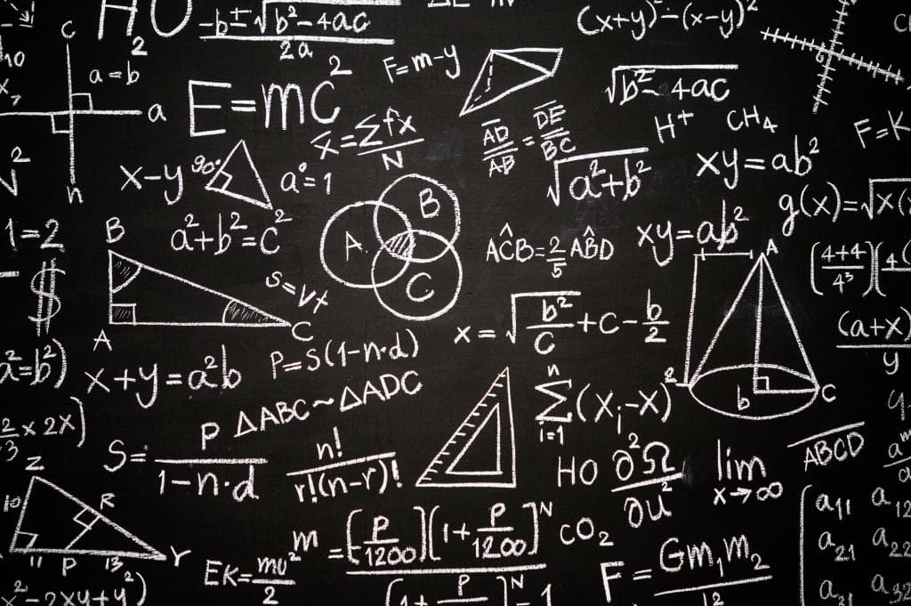Blackboard inscribed with scientific formulas and calculations i college mathematics majors